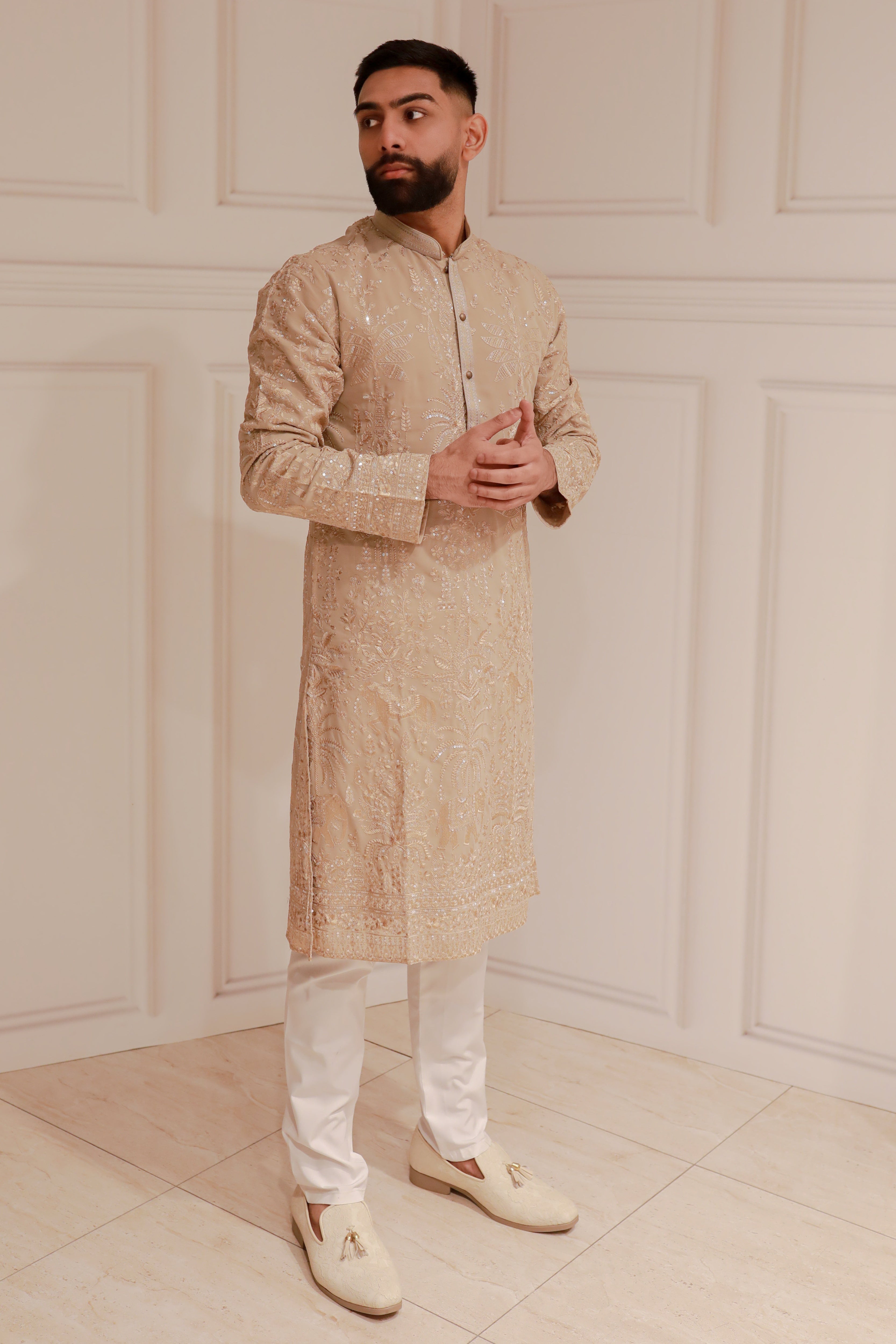 FULLY EMBROIDERY GOLD KURTA WITH WHITE TROUSERE