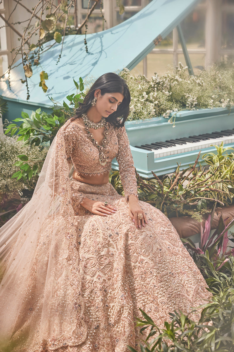 ELEGANT LIGHT GOLD LEHENGA WITH STYLISH FULL SLEEVES TOP AND VEIL