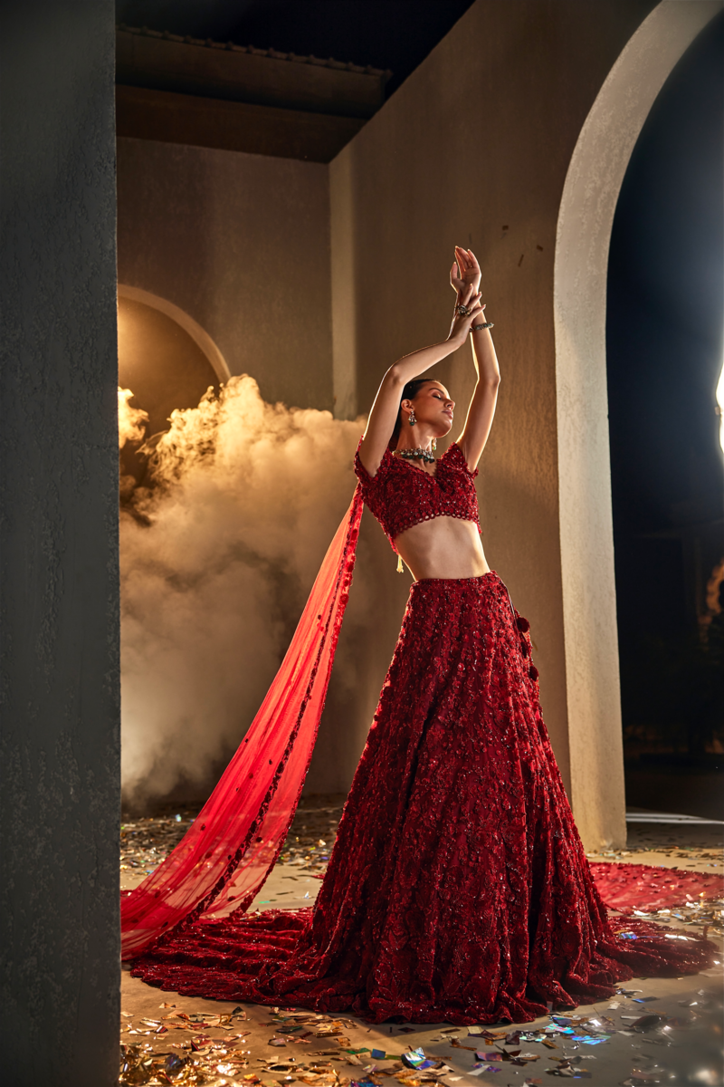 ELEGANT RED LEHENGA WITH EMBROIDERY TOP ATTACHED CAPE