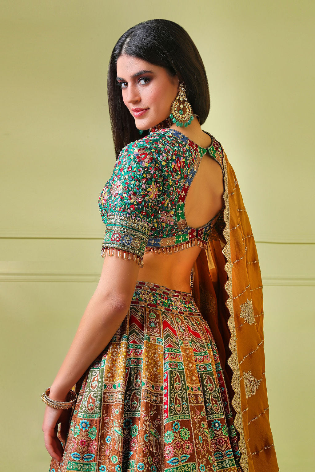 Green Embroidery top with multicolour Lehenga