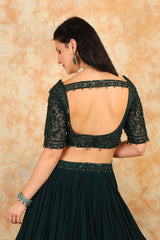 Embroidered bottle green top with georgette skirt