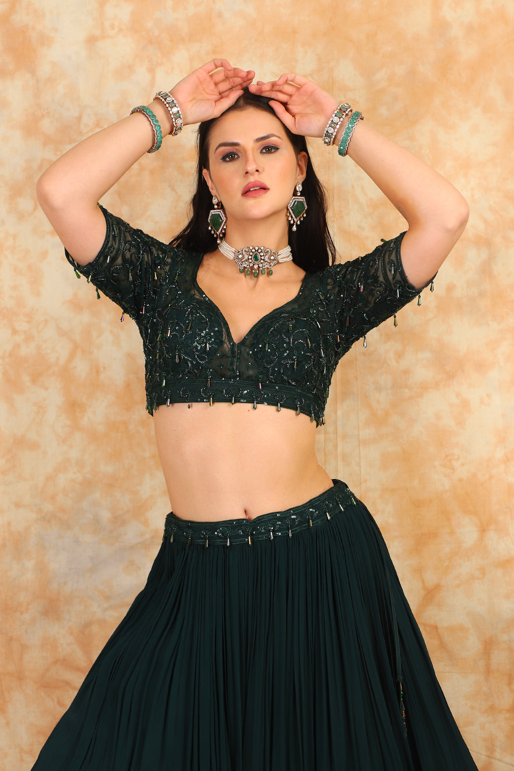Embroidered bottle green top with georgette skirt