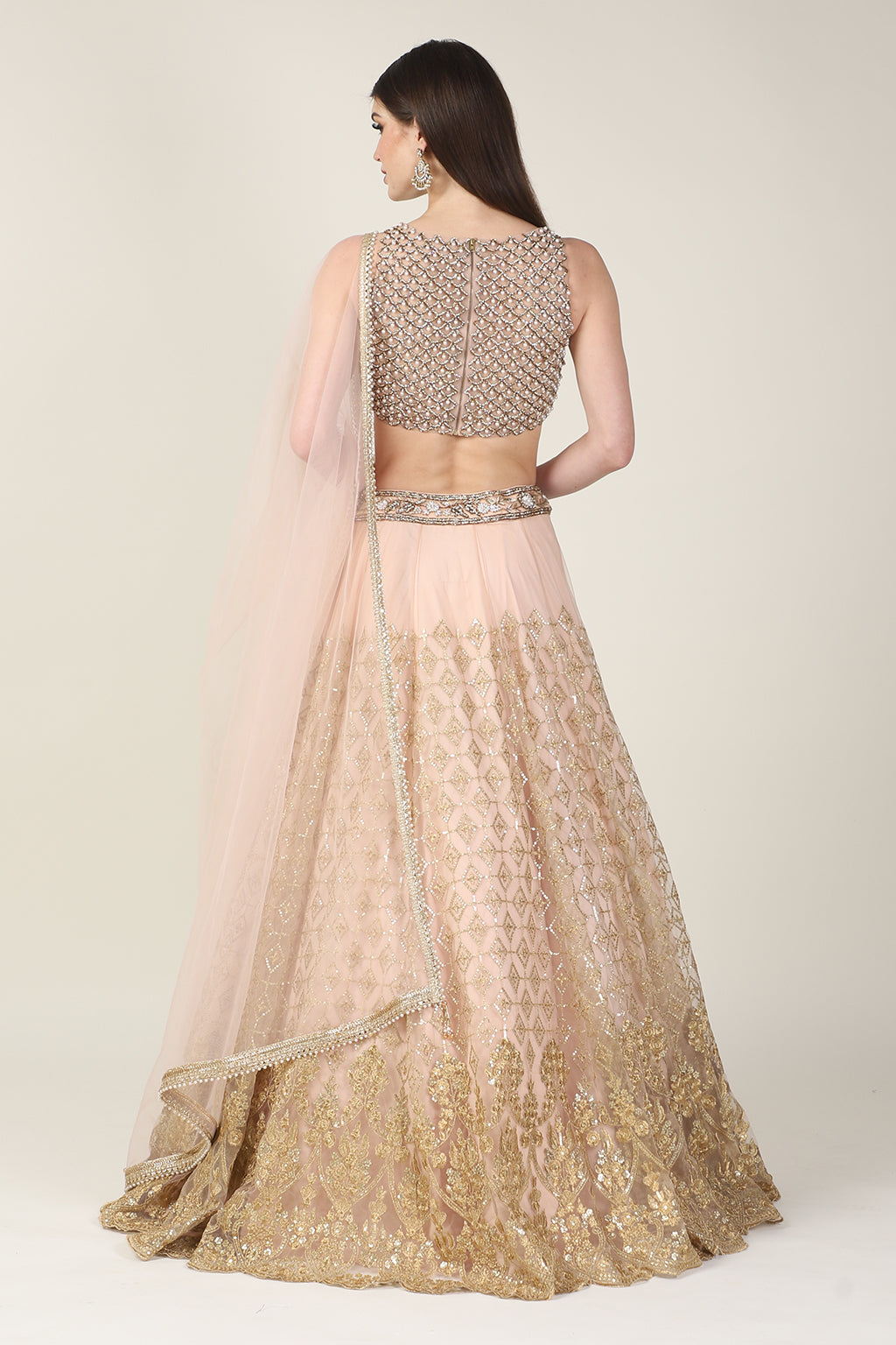 PEACH PEARL TOP WITH GOLDEN ZARI SKIRT