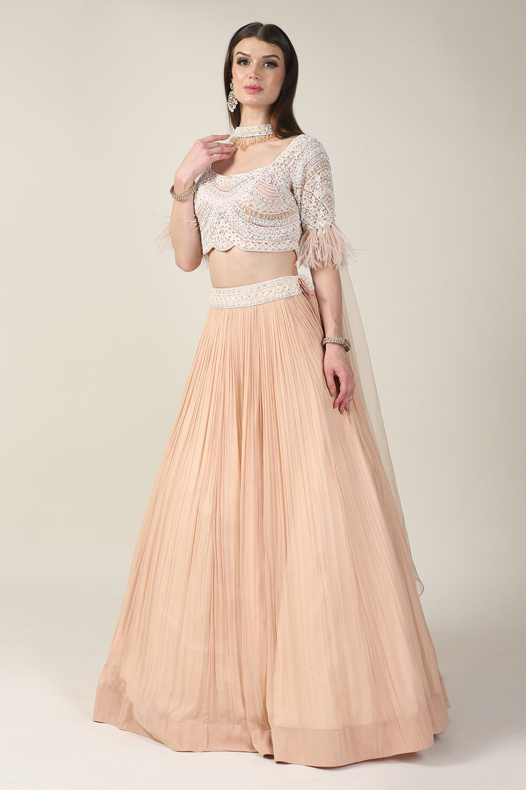 PEACH EMB TOP, FEATHER ON SLEEVE WITH RUSSING SKIRT