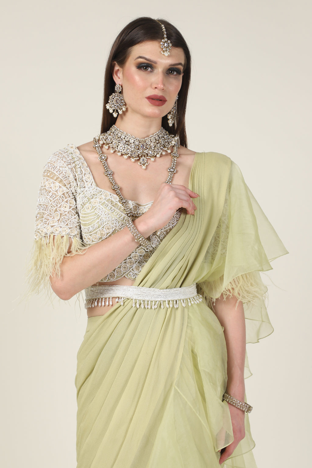 PISTA GREEN EMB TOP, FEATHER ON SLEEVE WITH DRAPE SAREE