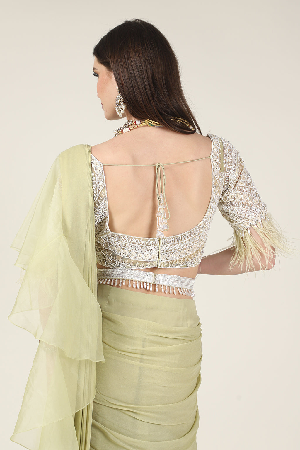 PISTA GREEN EMB TOP, FEATHER ON SLEEVE WITH DRAPE SAREE