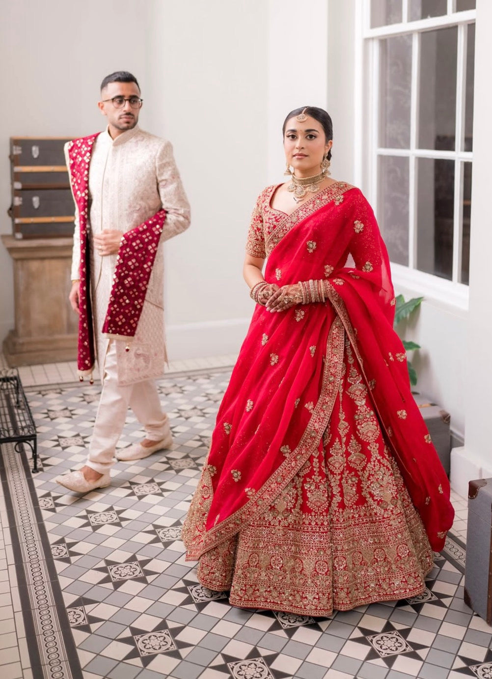 Kyle & Shivani in Ivory & Crimson Wedding Attire