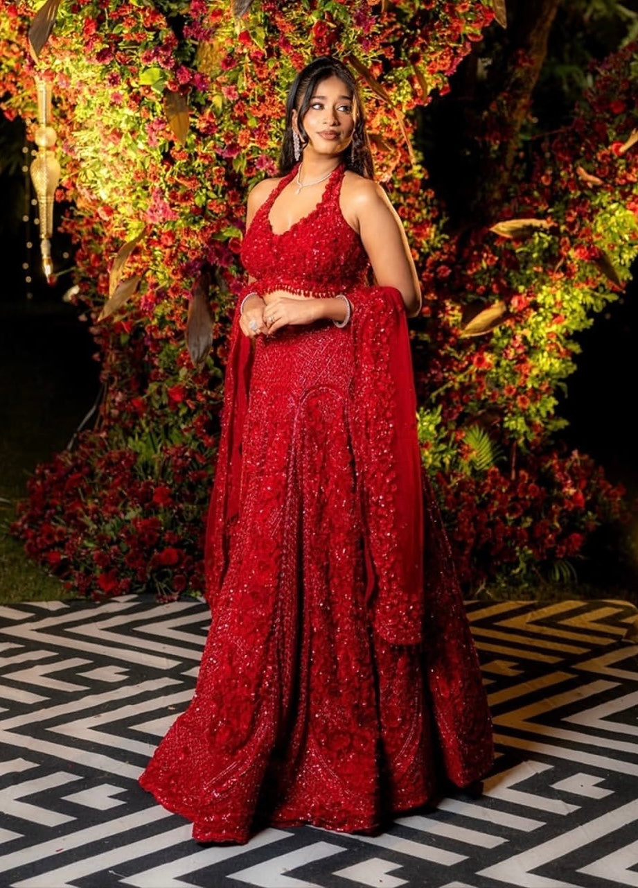 Sri Murahari in Ruby Red Embellished Lehenga