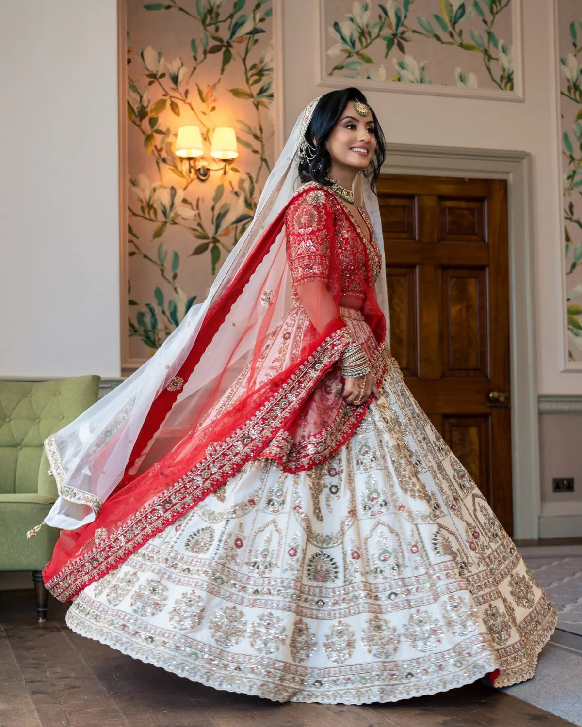 Asha & Pritesh in Ivory & Red Wedding Attire