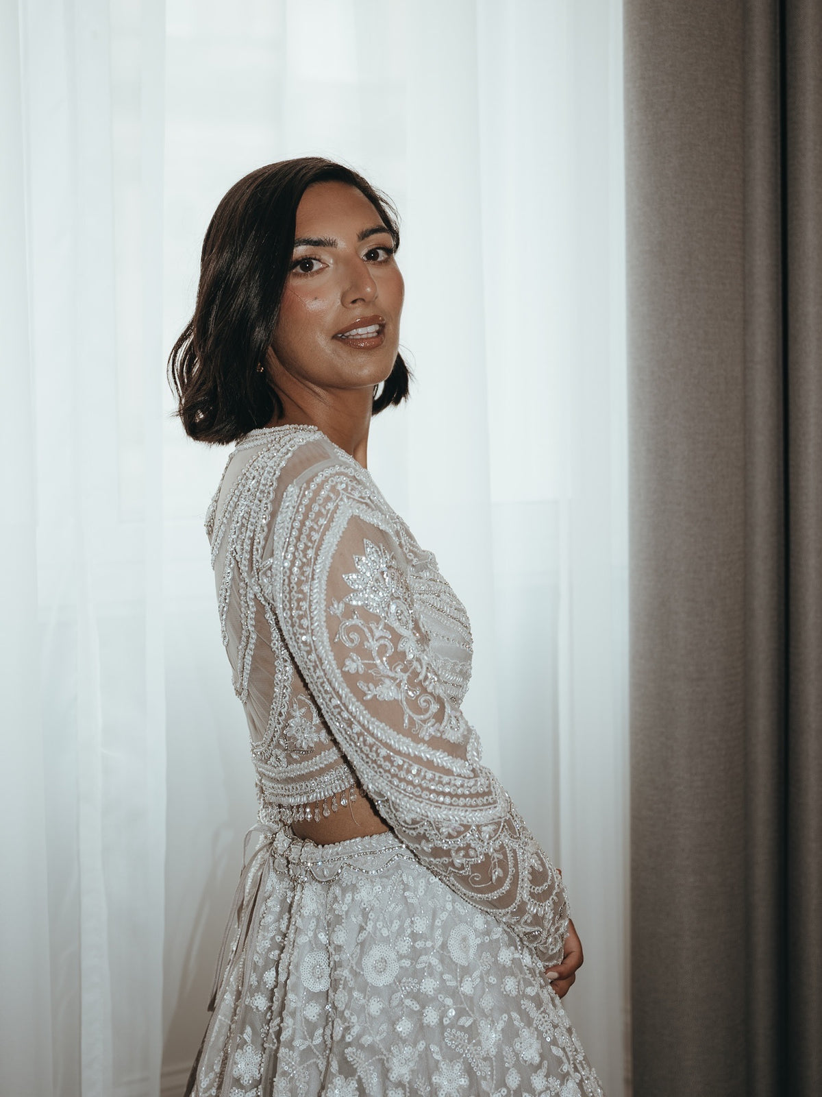 Marya Hanna in White Floral Pearl Lehenga