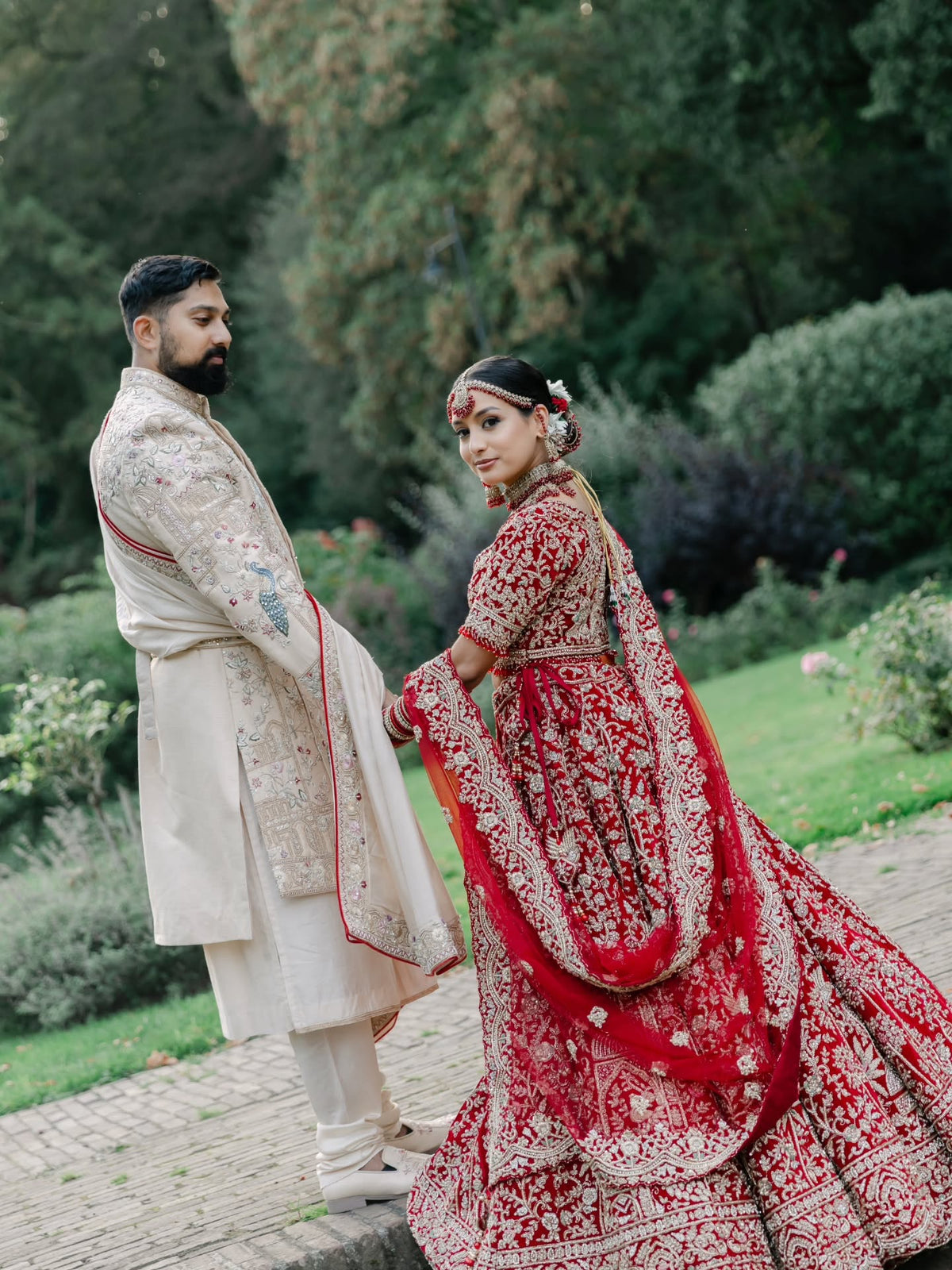 Manesha & Adesh in Red Zardozi & Ivory Wedding Attire