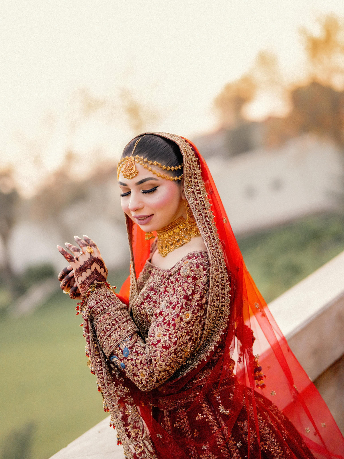 Anam in Ruby Maroon Bridal Lehenga