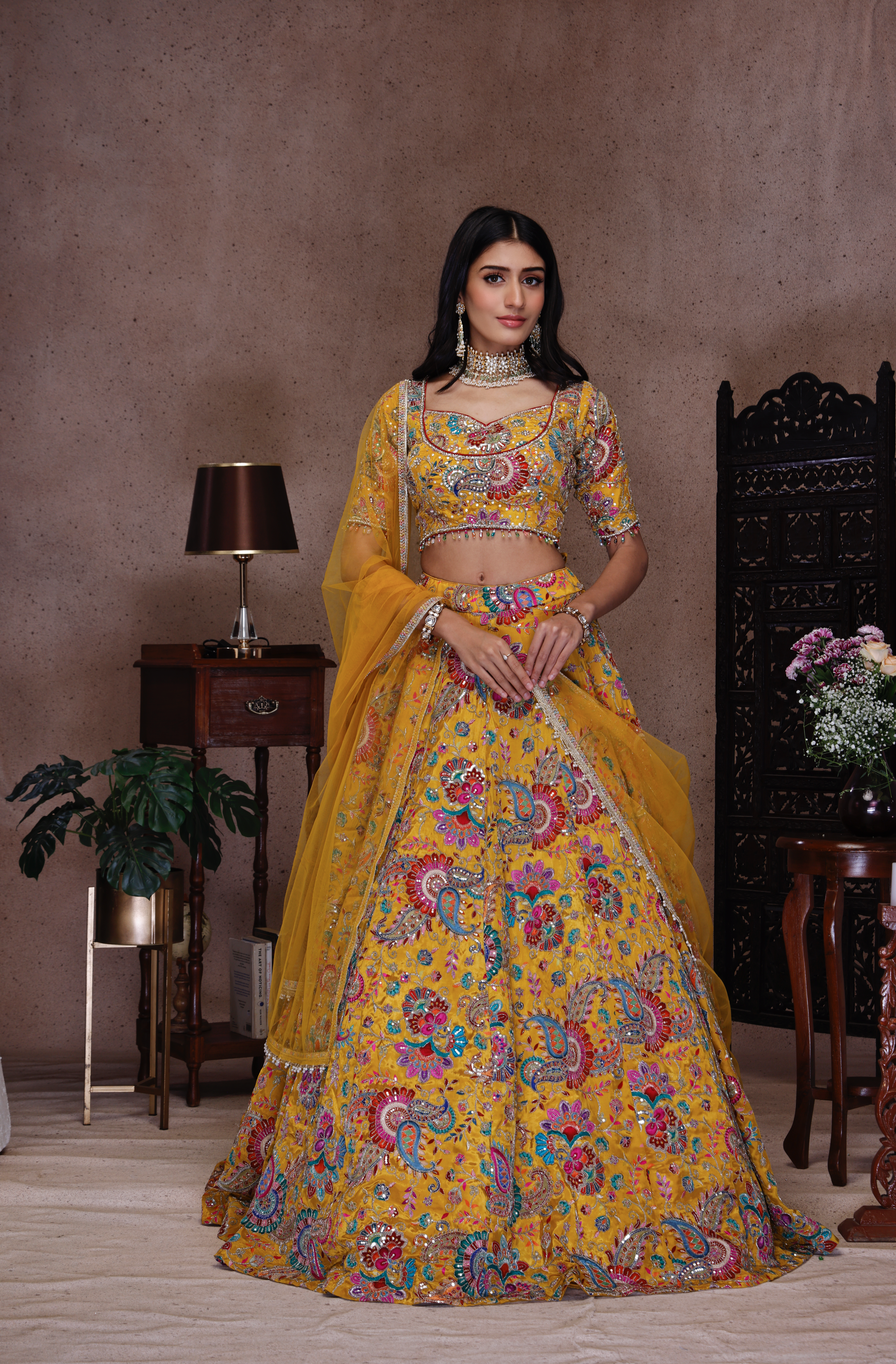 YELLOW EMBROIDERY LEHENGA AND TOP WITH NET DUPATTA
