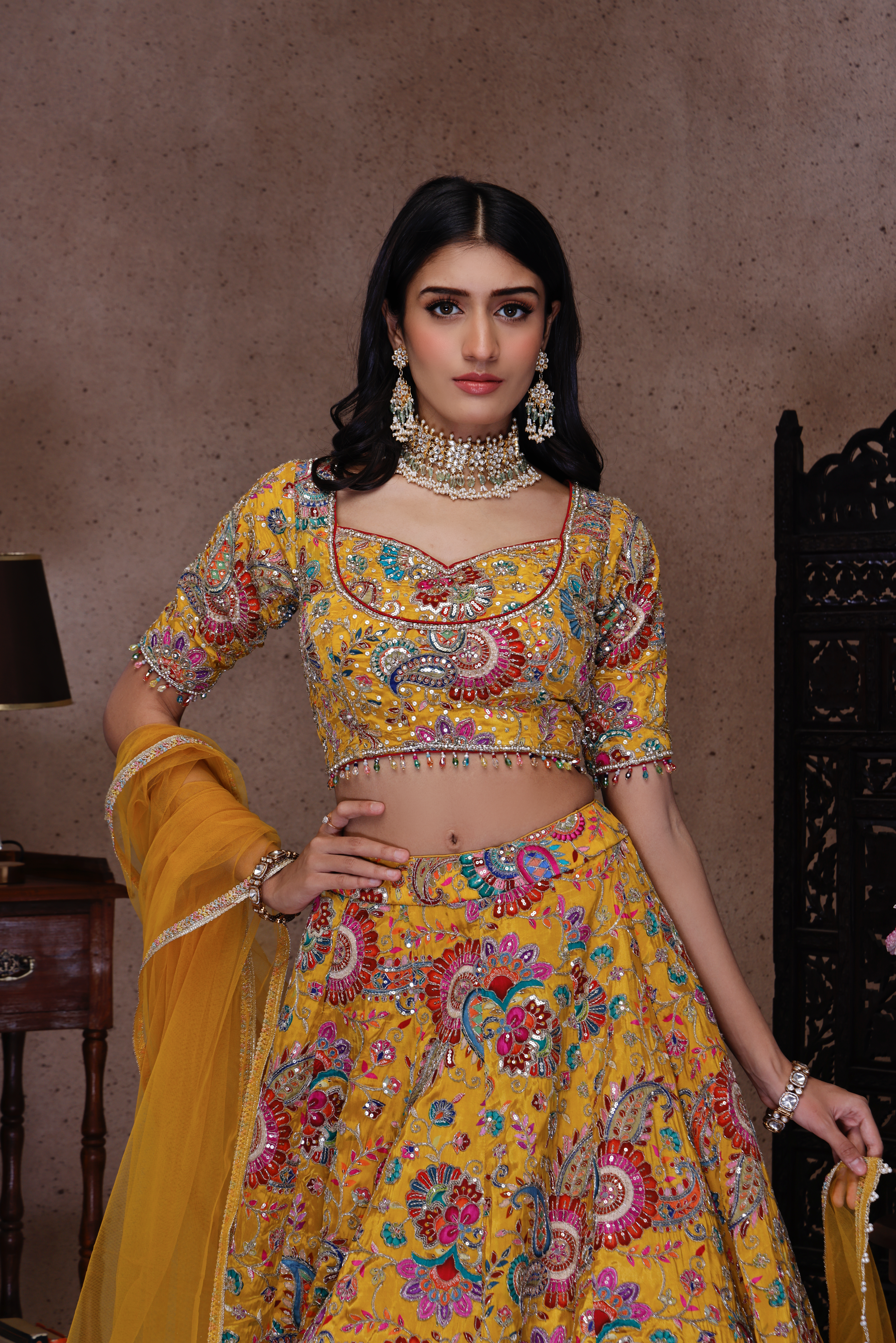 YELLOW EMBROIDERY LEHENGA AND TOP WITH NET DUPATTA