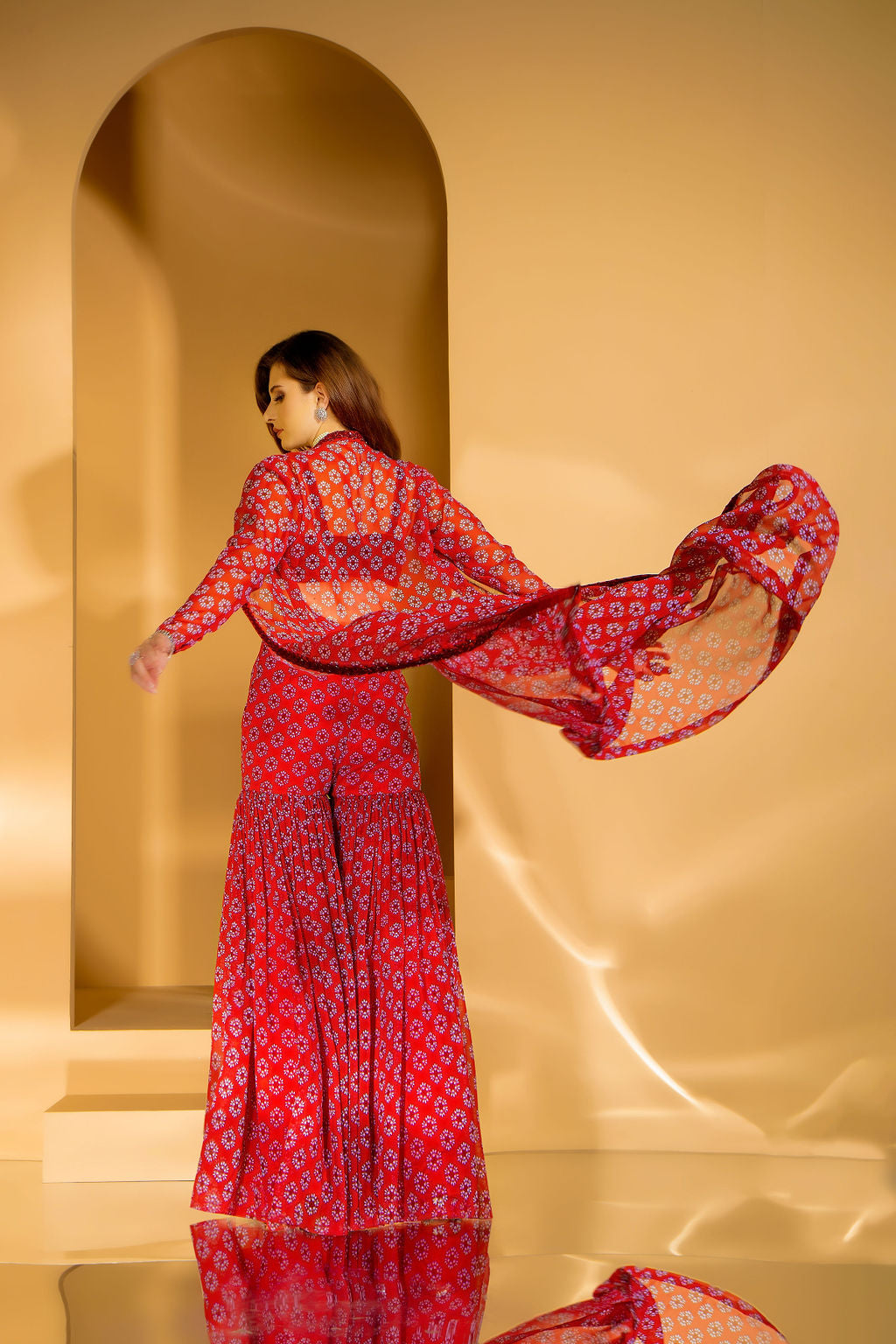 Beautiful Red Printed Gharara with embroidered top and jacket