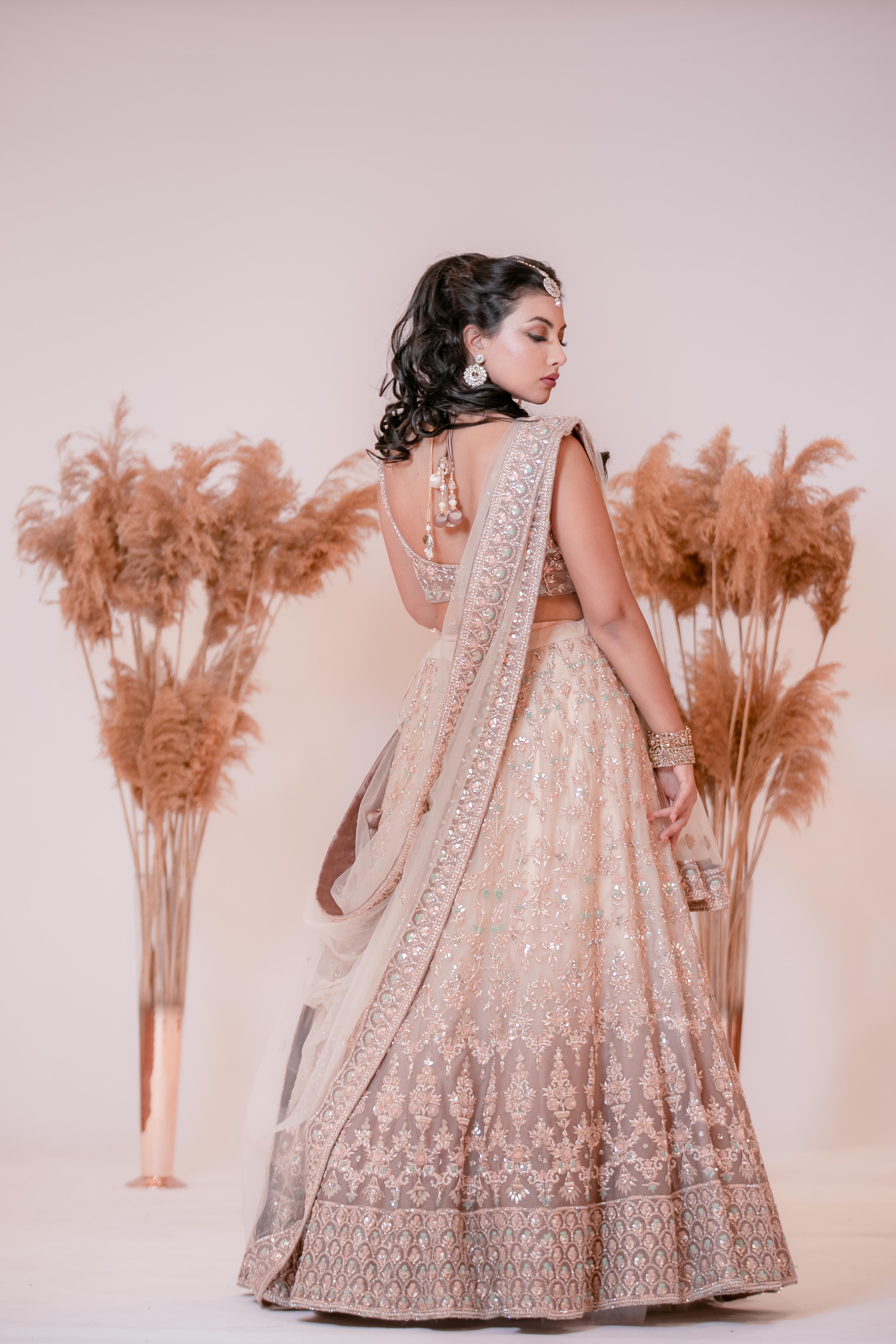 Zardozi highlighed Ombre Gota Pati Lehenga