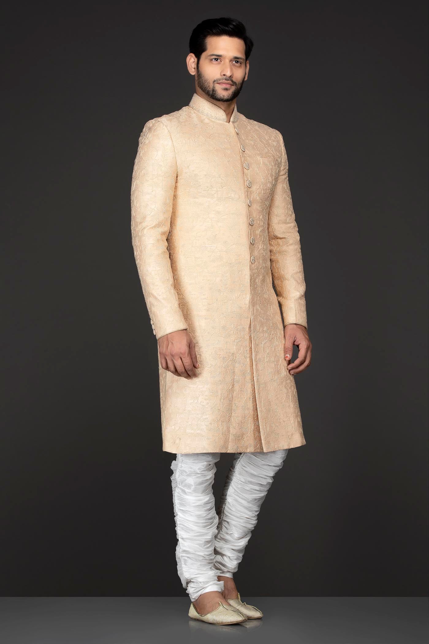 Peach Brocade Sherwani With Embroidery Buttons Paired With White Trousers