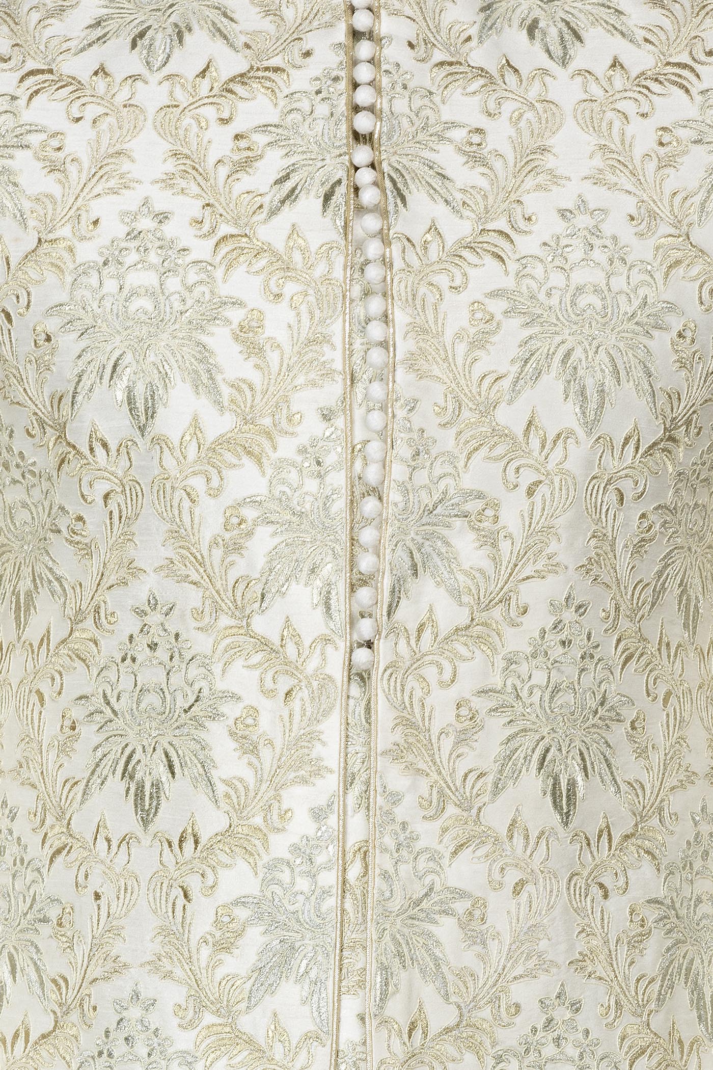 Ivory Colour Silk Sherwani With Silver Zari And Dori Embroidery Paired With Gold Bottoms