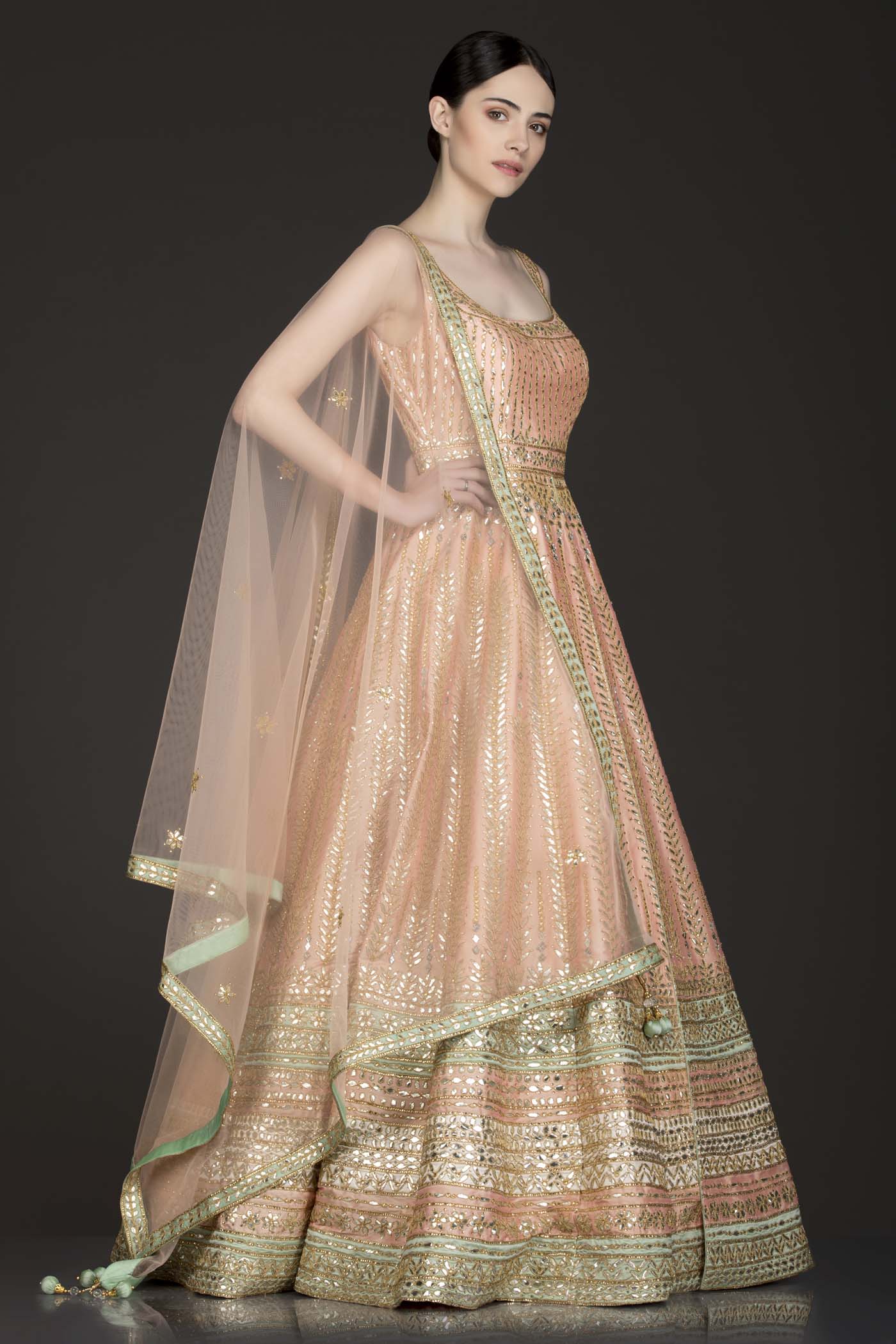 Peach Colour Silk Anarkali/Gown With Front Slit And Attached Skirt With Net Dupatta