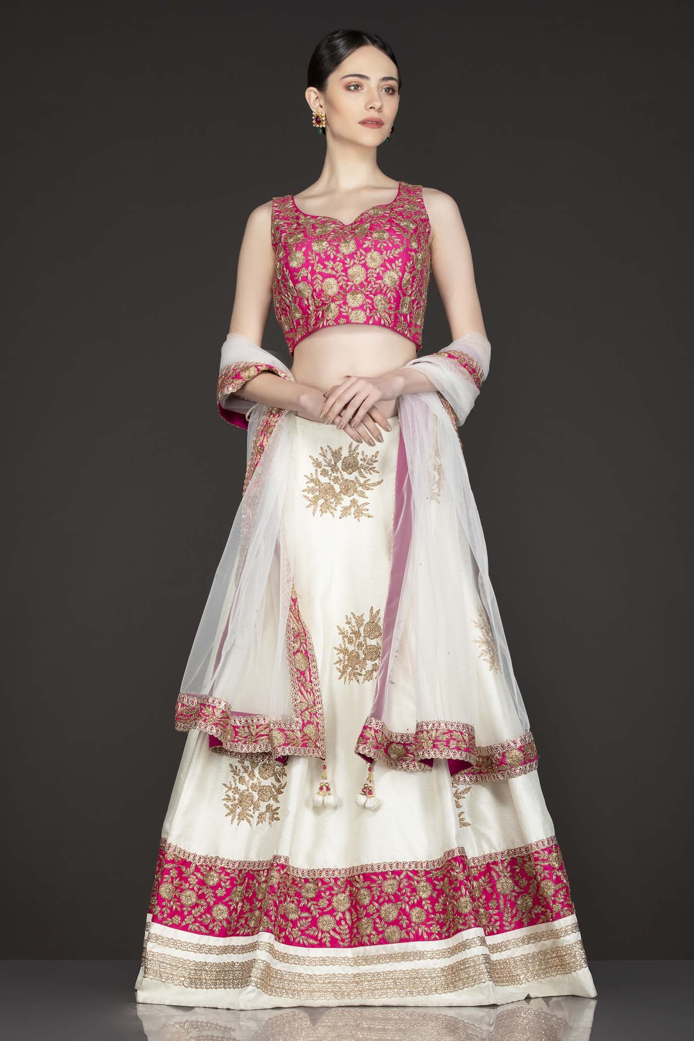Fuchsia Pink Silk Top With Ivory Silk Lehenga With Net Dupatta