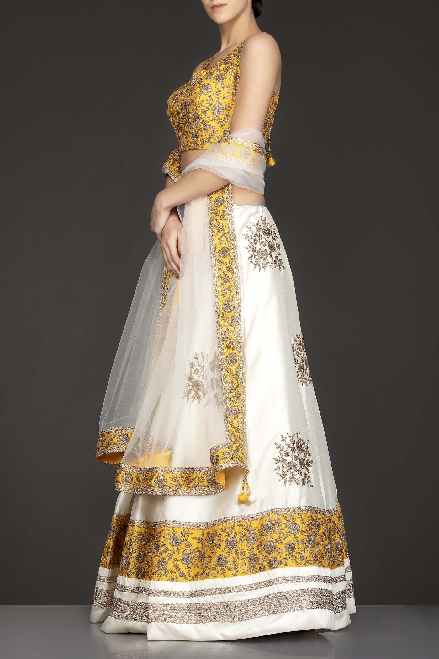 Yellow Silk Top With Ivory Silk Lehenga With Net Dupatta