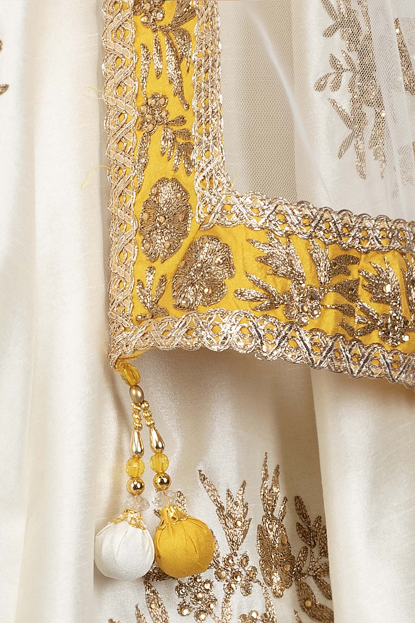 Yellow Silk Top With Ivory Silk Lehenga With Net Dupatta