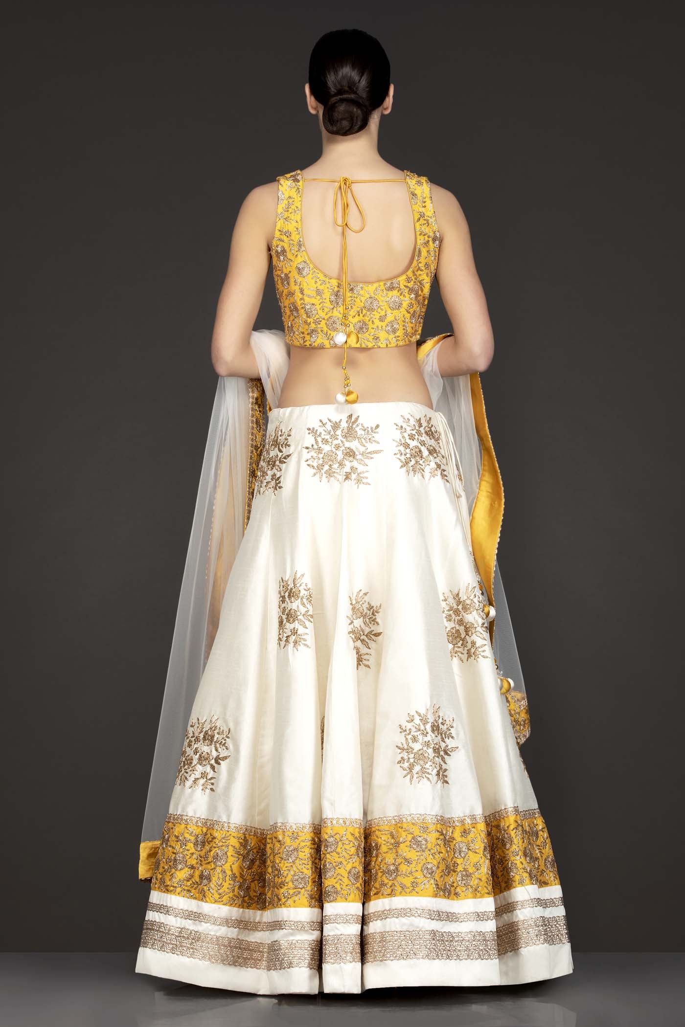 Yellow Silk Top With Ivory Silk Lehenga With Net Dupatta