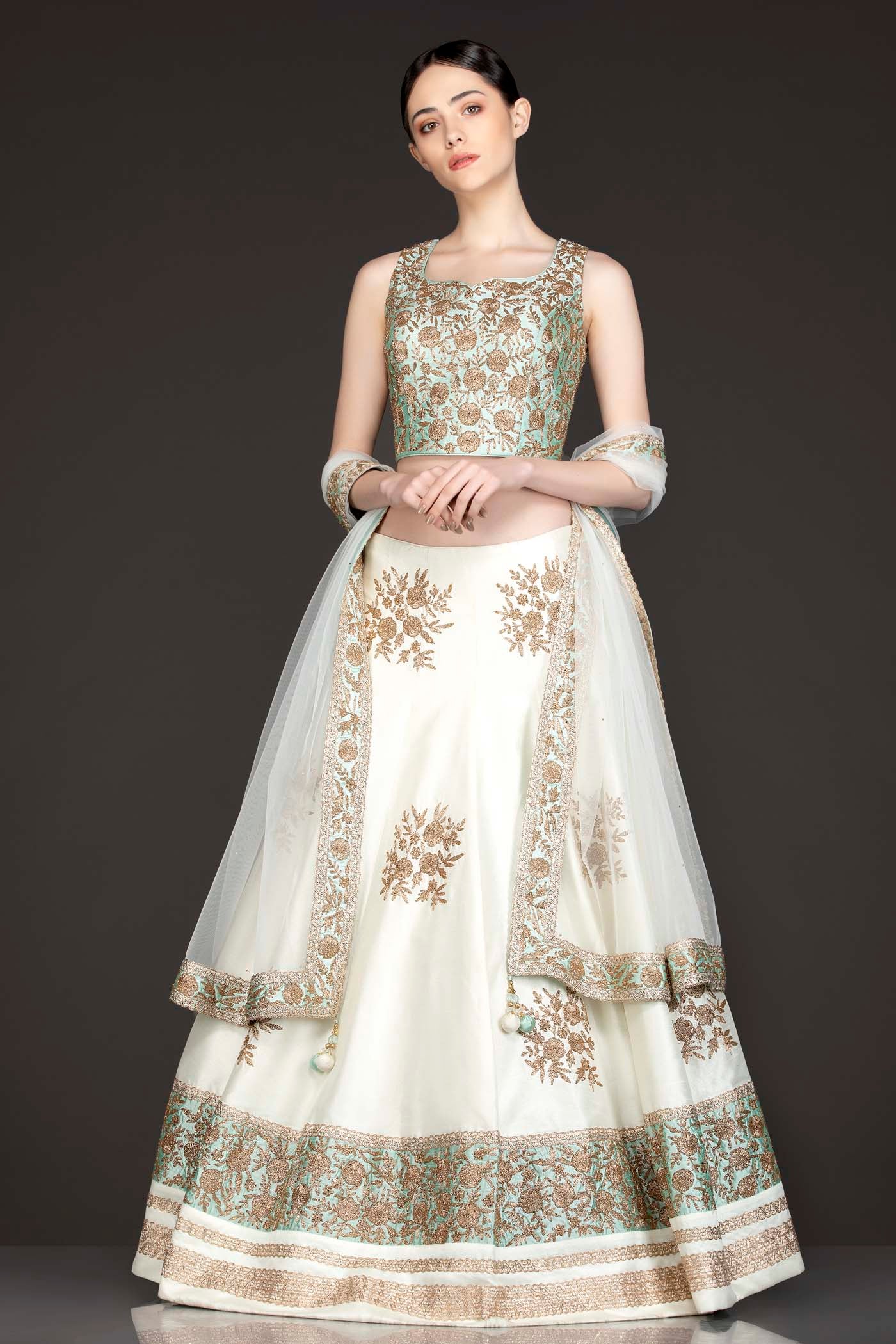 Mint Green Silk Top With Ivory Silk Lehenga With Net Dupatta