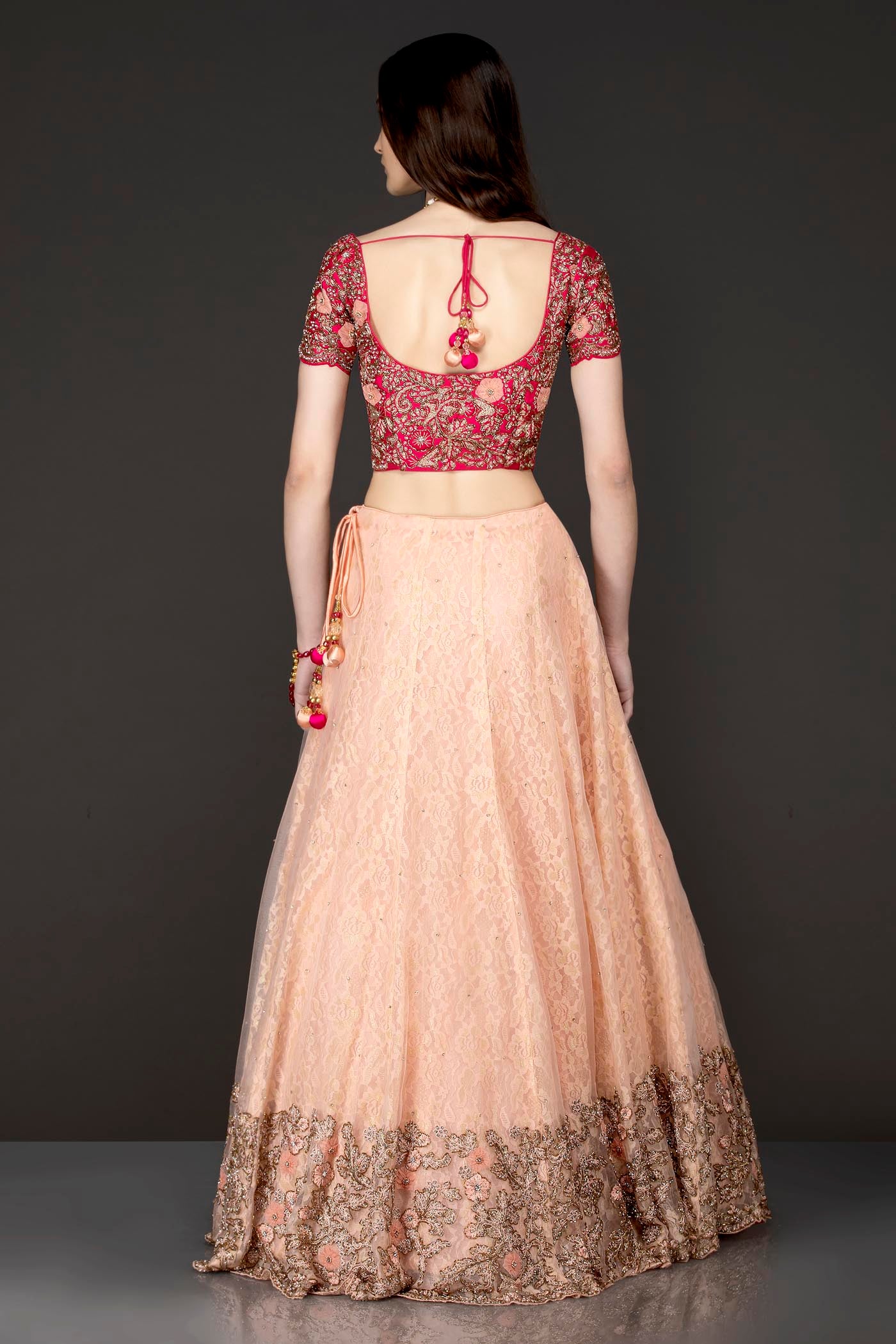Fuchsia Pink Silk Top And Peach Organza Skirt With Lace Linning With Peach Net Dupatta