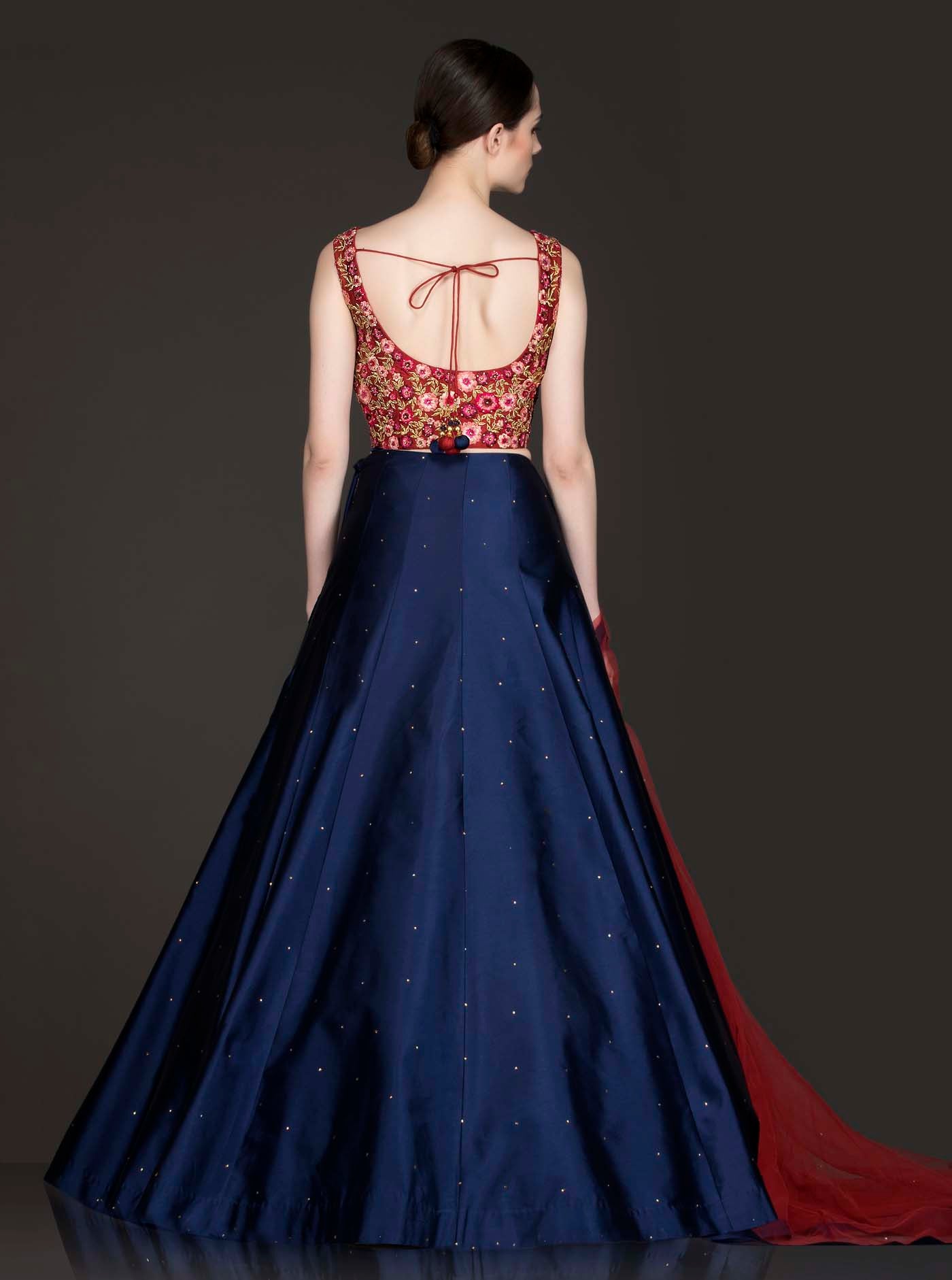Maroon Silk Thread Work And Zari Embroidery Top With Royal Blue Silk Skirt And Maroon Net Dupatta
