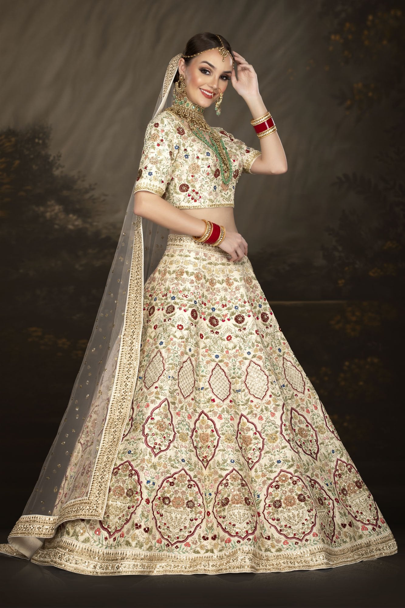 Multi-thread Embroidered Ivory bridal lehenga choli