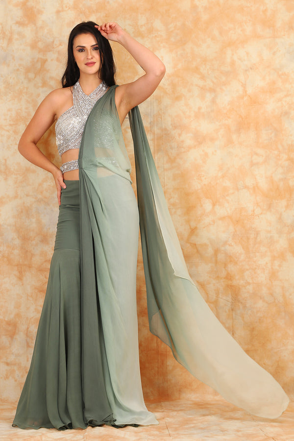 embroidered blouse with georgette Saree.