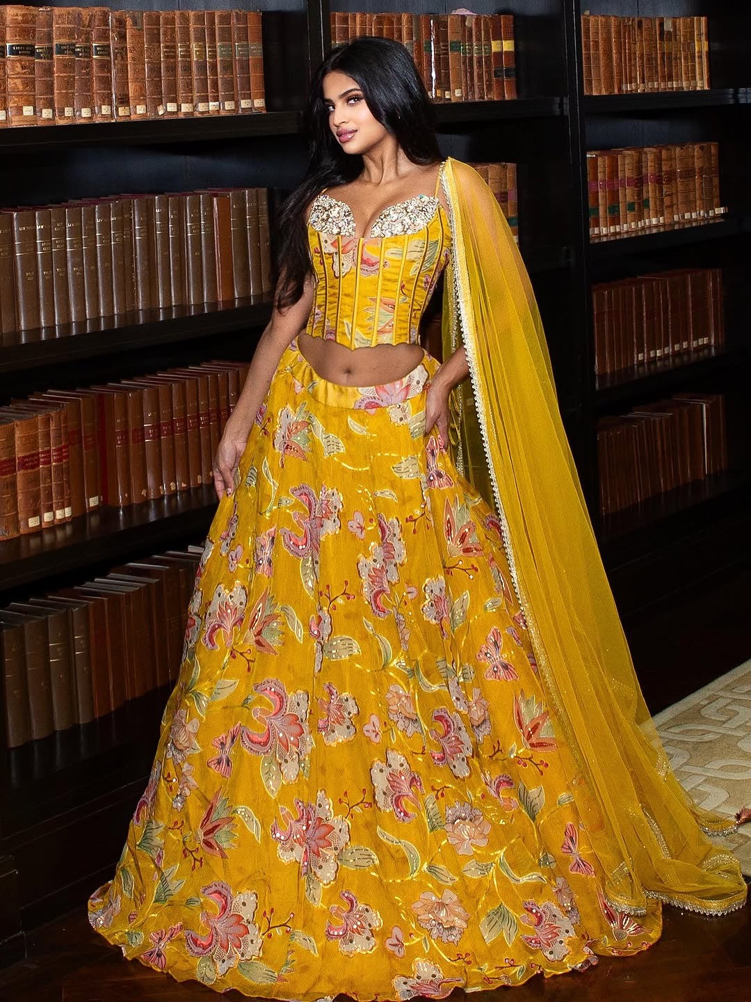 Mustard yellow corset with floral organza lehenga set with dupatta