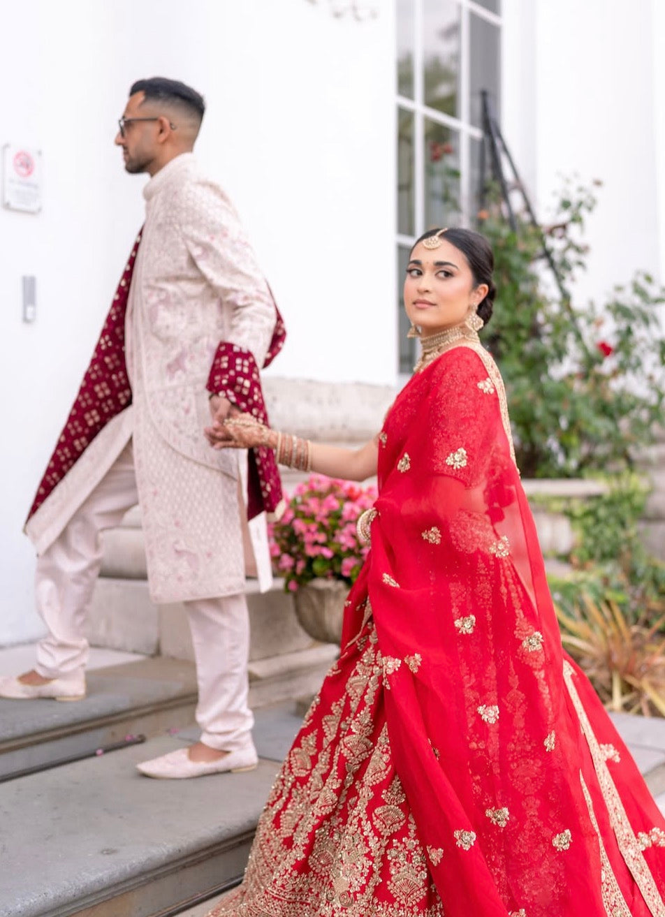 Kyle & Shivani in Ivory & Crimson Wedding Attire