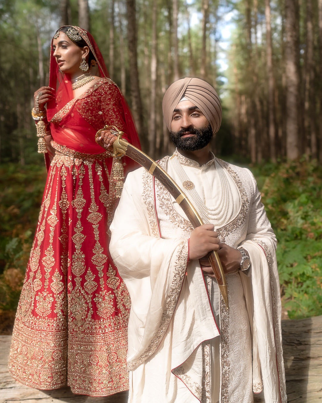 Kajal & Saroop in Regal Red-Ivory Wedding Attire