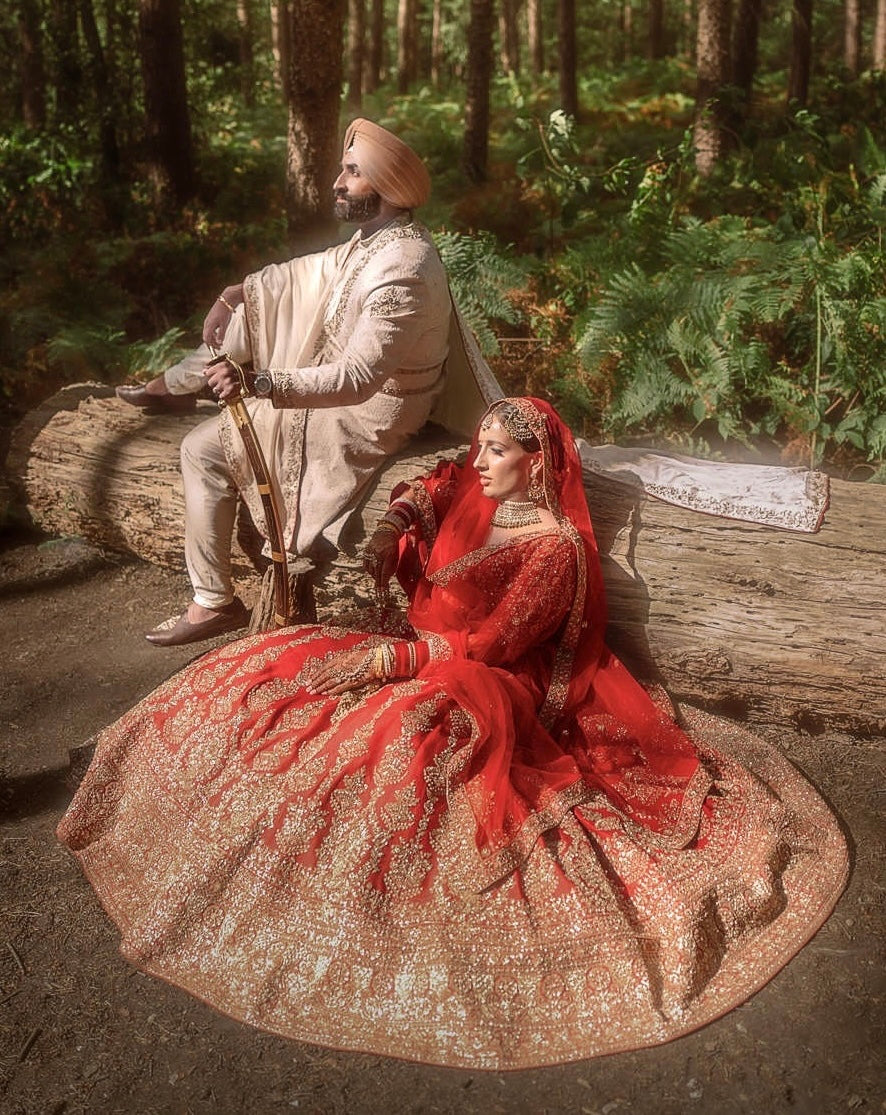 Kajal & Saroop in Regal Red-Ivory Wedding Attire