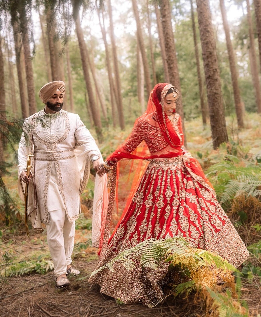 Kajal & Saroop in Regal Red-Ivory Wedding Attire