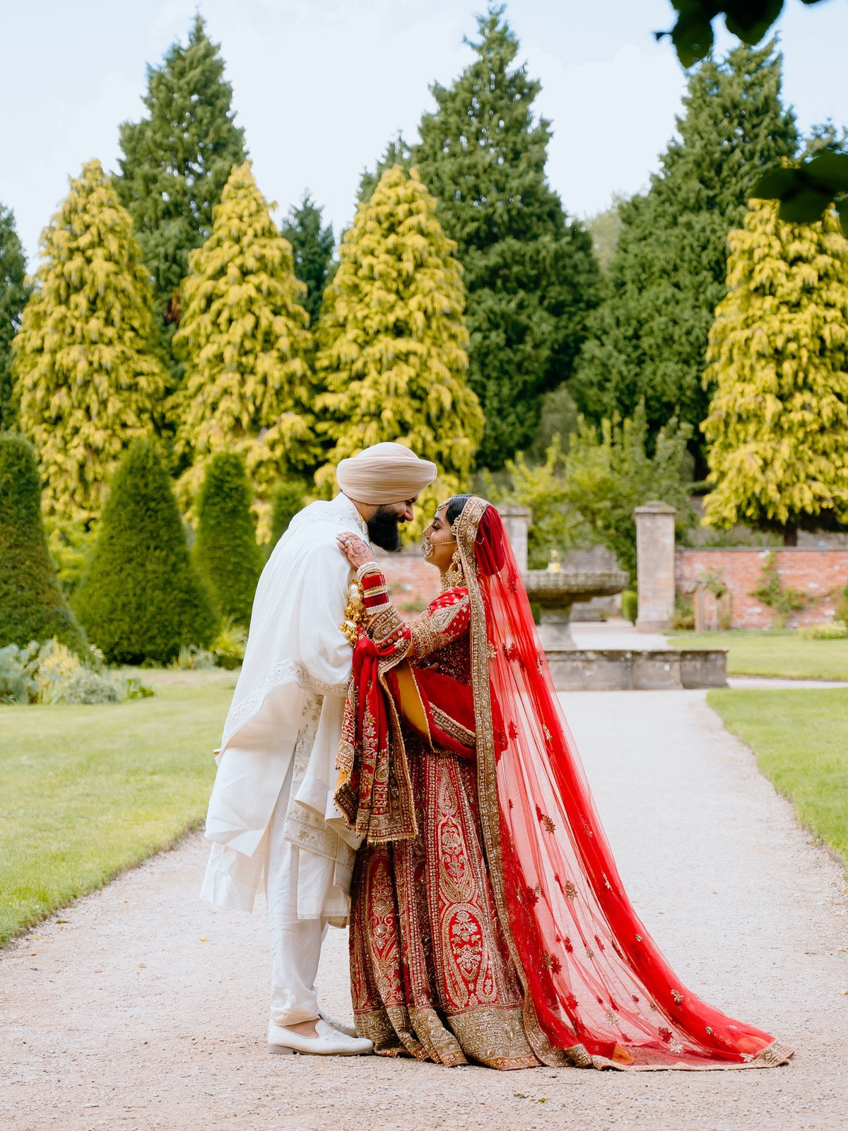 Jaspreet's Anand Karaj in Crimson Red Lehenga