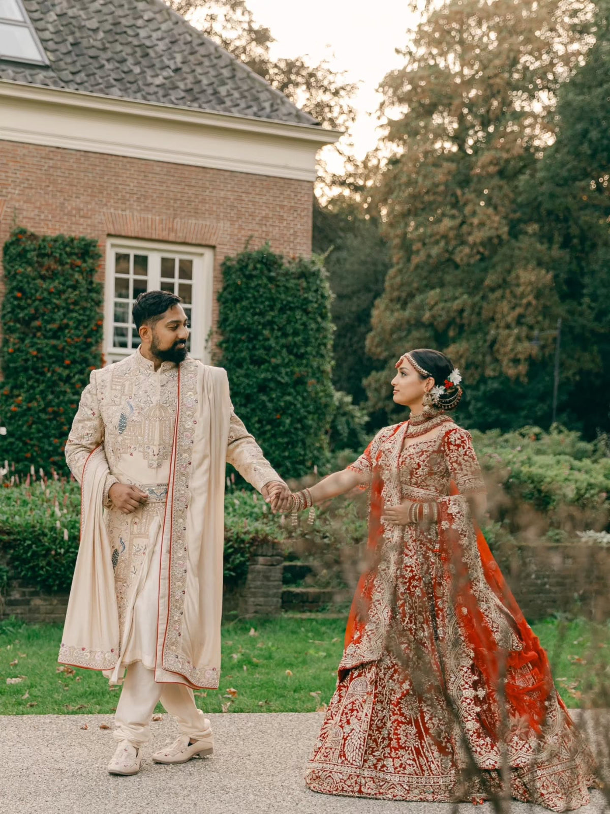 Manesha & Adesh in Red Zardozi & Ivory Wedding Attire