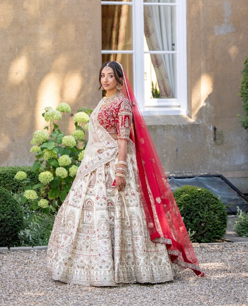 Lakshmi & Sanath in Heritage Ivory-Red Wedding Attire