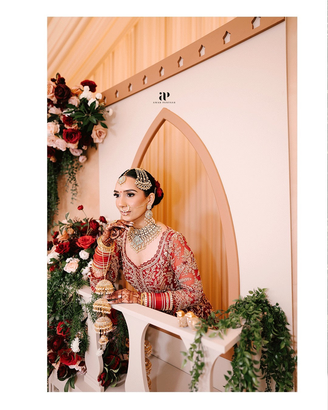 Bride Aman in Maroon Gold Embroidered Lehenga