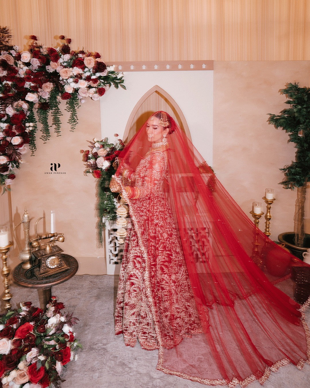 Bride Aman in Maroon Gold Embroidered Lehenga