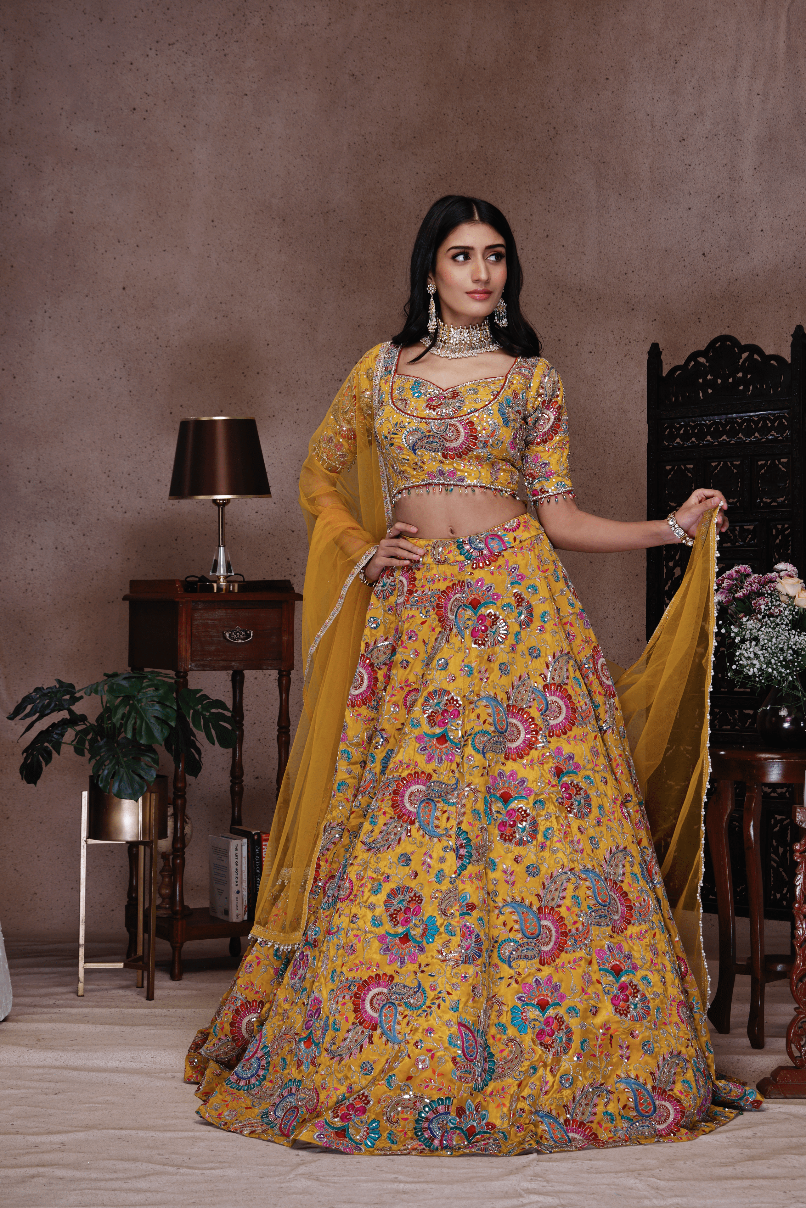 YELLOW EMBROIDERY LEHENGA AND TOP WITH NET DUPATTA