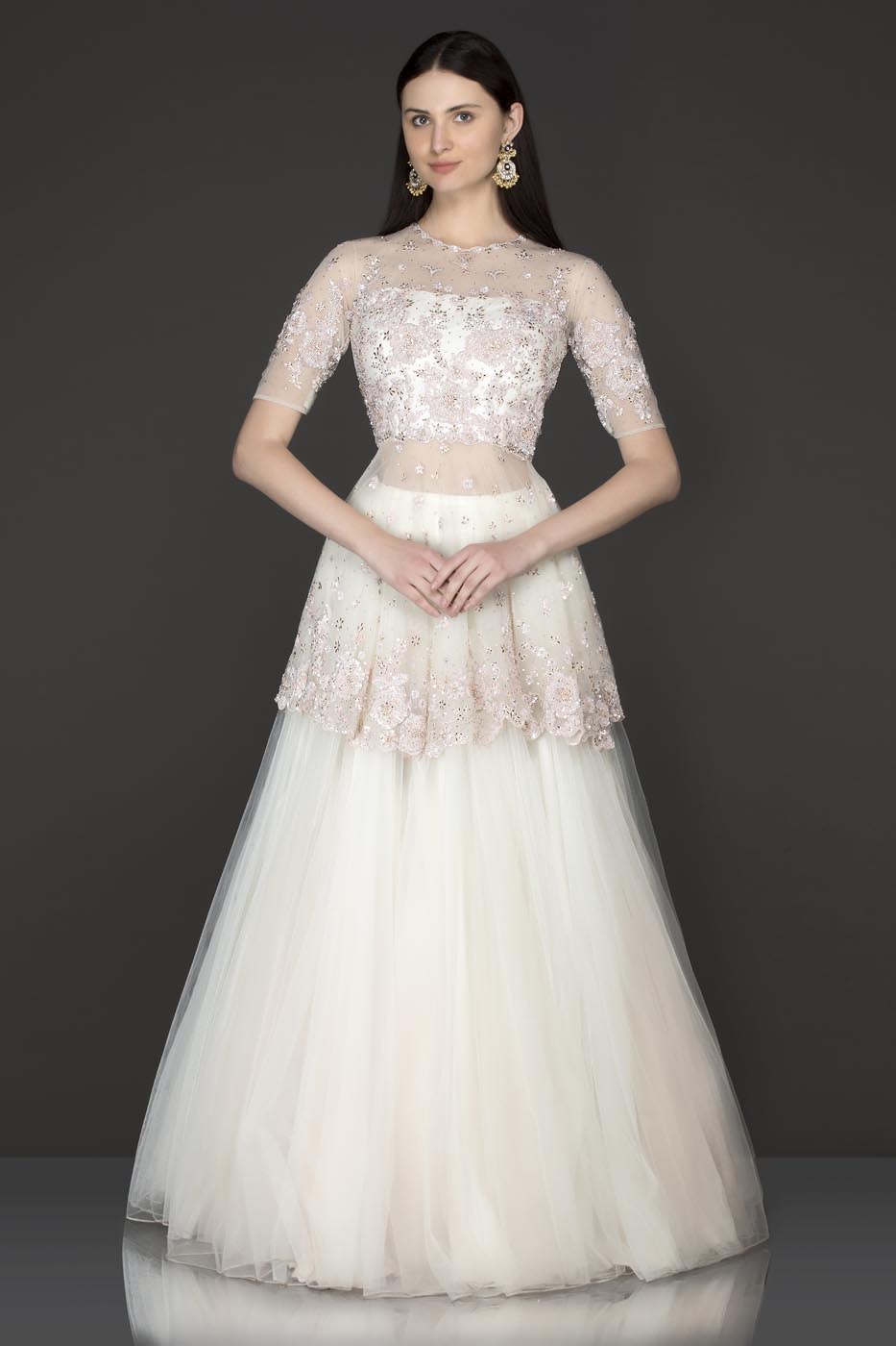 White Colour Net Peplum Top And Net Skirt With Pink Sequence Embroidery