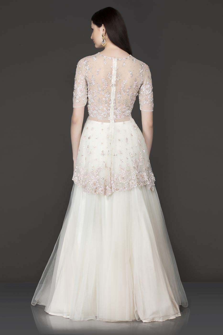 White Colour Net Peplum Top And Net Skirt With Pink Sequence Embroidery