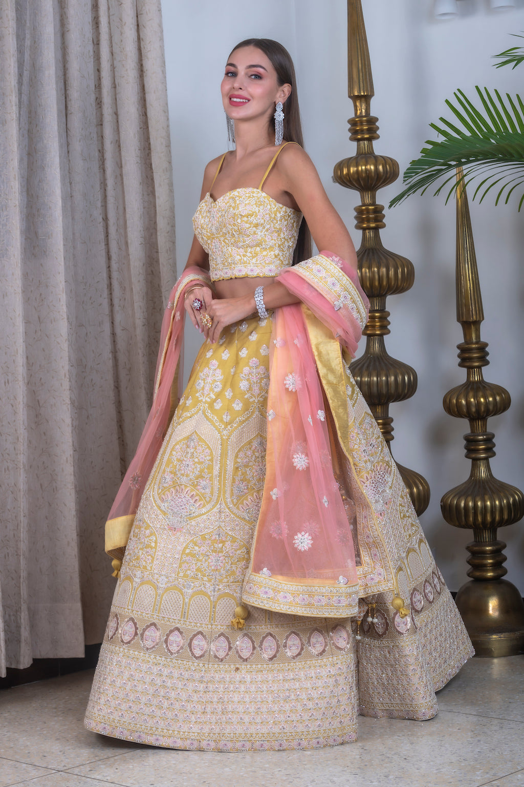 Yellow Lehenga with contrast peach scarf