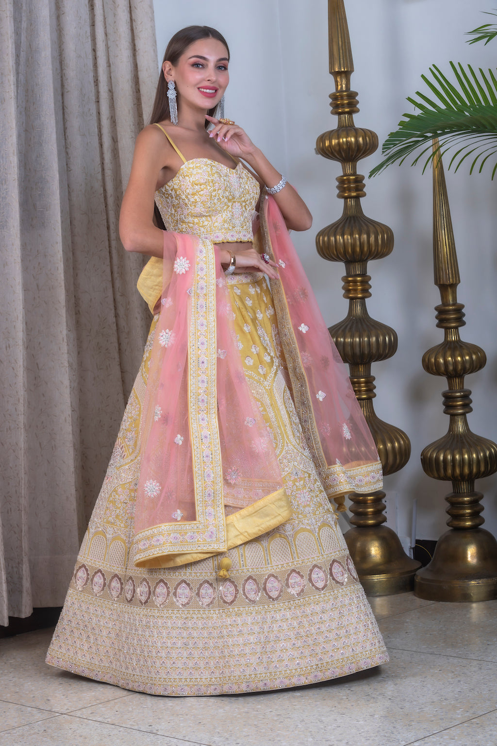Yellow Lehenga with contrast peach scarf