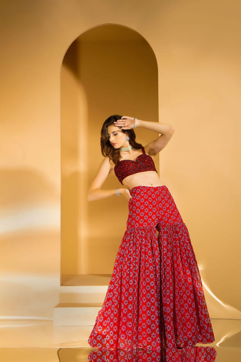 Beautiful Red Printed Gharara with embroidered top and jacket