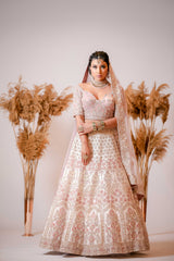 Ivory silk Lehenga with embroidered Corset Blouse
