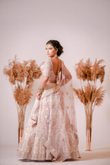 Ivory silk Lehenga with embroidered Corset Blouse